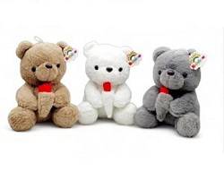 عروسک خرس گل به دست 28سانت